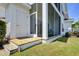 Exterior view of property featuring a screened porch with deck access at 8855 Radcliff Dr. Nw # 50B, Calabash, NC 28467