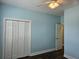 Bedroom features a ceiling fan, neutral walls, beautiful floors, and a large closet at 1028 Cherry Tree Ln., North Myrtle Beach, SC 29582