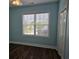 Bedroom with neutral walls, attractive flooring, a ceiling fan, and good natural light from the window at 1028 Cherry Tree Ln., North Myrtle Beach, SC 29582