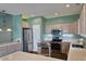 Well-equipped kitchen with stainless steel appliances and ample counter space at 1028 Cherry Tree Ln., North Myrtle Beach, SC 29582