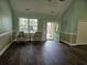 Bright living space with a large window and stylish furnishings at 1028 Cherry Tree Ln., North Myrtle Beach, SC 29582