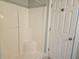 Clean and bright stand-up shower with molded seat and easy access to the rest of the bathroom at 1028 Cherry Tree Ln., North Myrtle Beach, SC 29582