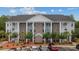 Charming apartment complex with attractive stone accents and well-manicured landscaping at 124 Birch N Coppice Dr. # 1, Surfside Beach, SC 29575