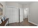 Hallway with a closet and a door to the restroom at 124 Birch N Coppice Dr. # 1, Surfside Beach, SC 29575