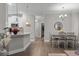 Open-concept design showcasing a modern kitchen and dining area with hardwood flooring at 124 Birch N Coppice Dr. # 1, Surfside Beach, SC 29575