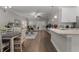 Bright and open living room with modern finishes and seamless flow to the dining area at 124 Birch N Coppice Dr. # 1, Surfside Beach, SC 29575