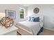 Inviting bedroom featuring a bed, accent wall, and bright, natural light at 1402 Nokota Dr., Conway, SC 29526