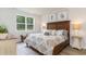 Bright bedroom with a large window, wood-look floors, and coastal-themed decor at 1402 Nokota Dr., Conway, SC 29526