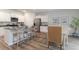 Bright kitchen area with a large island, stainless steel appliances, and an adjacent dining area at 1402 Nokota Dr., Conway, SC 29526