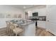 Modern kitchen featuring white cabinetry, stainless steel appliances, and a granite island with seating at 1402 Nokota Dr., Conway, SC 29526