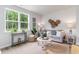 Comfortable living room with a large window providing natural light and stylish decor at 1402 Nokota Dr., Conway, SC 29526