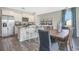 Open concept kitchen with granite countertops, stainless steel appliances and adjacent dining area at 1442 Nokota Dr., Conway, SC 29526