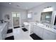 Bright bathroom featuring a soaking tub, double vanity with marble countertops, and a tiled shower at 1455 Whooping Crane Dr., Conway, SC 29526
