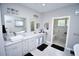 Spacious bathroom with a double vanity, soaking tub, and tiled shower area at 1455 Whooping Crane Dr., Conway, SC 29526