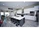 Beautiful kitchen features a large center island, stainless steel appliances, and modern finishes at 1455 Whooping Crane Dr., Conway, SC 29526