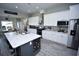 Beautiful kitchen features a large center island, stainless steel appliances, and modern finishes at 1455 Whooping Crane Dr., Conway, SC 29526