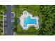 Overhead view of a community pool featuring manicured landscaping and convenient parking at 155 Chenoa Dr. # D, Murrells Inlet, SC 29576