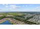 Expansive aerial view showcases a residential community with lush greenery and scenic waterways at 155 Chenoa Dr. # D, Murrells Inlet, SC 29576