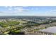 Expansive aerial view showcasing a well-designed residential area with multiple ponds and green spaces at 155 Chenoa Dr. # D, Murrells Inlet, SC 29576