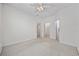 Spacious bedroom with neutral carpet and access to closet and hallway at 155 Chenoa Dr. # D, Murrells Inlet, SC 29576