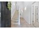 Bright foyer with stairway, high ceilings, and a combination of tile and carpet flooring at 155 Chenoa Dr. # D, Murrells Inlet, SC 29576