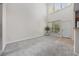 Sunlit living room with high ceilings and big windows for lots of natural light at 155 Chenoa Dr. # E, Murrells Inlet, SC 29576