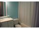 Updated bathroom with white vanity and modern fixtures at 1557 Elizabeth Rd., Myrtle Beach, SC 29577