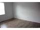 Empty bedroom with vinyl floors, a window, and neutral wall color at 1557 Elizabeth Rd., Myrtle Beach, SC 29577