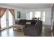 Comfortable living room with ample seating, creating an inviting atmosphere for relaxing and entertaining at 1557 Elizabeth Rd., Myrtle Beach, SC 29577