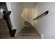 Carpeted staircase with white walls and black handrail at 1557 Elizabeth Rd., Myrtle Beach, SC 29577