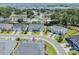 Expansive aerial view of a charming home nestled in a quiet residential neighborhood at 1584 Sand Harbor Cir. # 1584, Ocean Isle Beach, NC 28469