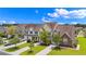 An aerial of townhomes with manicured lawns, mature trees, and a well-planned community layout at 2131 Cass Lake Dr. # 662, Carolina Shores, NC 28467