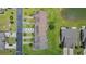 Aerial view of a residential community featuring well-maintained lawns, ponds, and lush landscaping at 2131 Cass Lake Dr. # 662, Carolina Shores, NC 28467