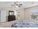 Bedroom features carpeted floors, natural lighting, and a dresser at 2131 Cass Lake Dr. # 662, Carolina Shores, NC 28467