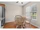 Dining area features a wooden table with chairs and natural light from the window at 2131 Cass Lake Dr. # 662, Carolina Shores, NC 28467