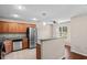 Well-lit kitchen with stainless steel appliances and granite countertops for a modern and functional cooking space at 2131 Cass Lake Dr. # 662, Carolina Shores, NC 28467