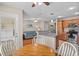 Kitchen with stainless appliances, granite counters, open to living area with hardwood floors at 2131 Cass Lake Dr. # 662, Carolina Shores, NC 28467