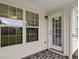 Covered patio with neutral decor and ample lighting at 2131 Cass Lake Dr. # 662, Carolina Shores, NC 28467