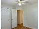 Bright bedroom with wood floors and a ceiling fan at 233 Melody Gardens Dr., Surfside Beach, SC 29575