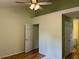 This bedroom features beautiful flooring and closet space at 233 Melody Gardens Dr., Surfside Beach, SC 29575