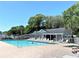 This community pool offers plenty of chairs for lounging and relaxing on a hot day at 233 Melody Gardens Dr., Surfside Beach, SC 29575