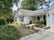 Charming home with manicured landscaping and inviting walkway at 233 Melody Gardens Dr., Surfside Beach, SC 29575