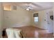 Bright living room featuring high ceilings, a fan, and an exterior door at 233 Melody Gardens Dr., Surfside Beach, SC 29575