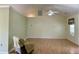 View of the living room showcasing the high ceilings and fan at 233 Melody Gardens Dr., Surfside Beach, SC 29575