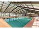 Inviting indoor pool area with ample seating and a bright, airy atmosphere at 233 Melody Gardens Dr., Surfside Beach, SC 29575