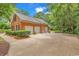 Three car brick garage and driveway with extra parking and landscaping for your convenience at 241 Black Duck Rd., Pawleys Island, SC 29585
