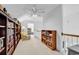 Upstairs hallway with built-in bookcases and cozy seating area at 241 Black Duck Rd., Pawleys Island, SC 29585