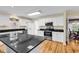 Spacious kitchen featuring white cabinets, stainless steel appliances, and granite countertops at 241 Black Duck Rd., Pawleys Island, SC 29585