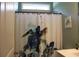 Bathroom with turtle shower curtain and decor with modern fixtures and a transom window at 242 Four Mile Rd., Conway, SC 29526