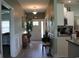 Warm entryway features stylish decor, with views into the kitchen, offers a welcoming ambiance at 242 Four Mile Rd., Conway, SC 29526